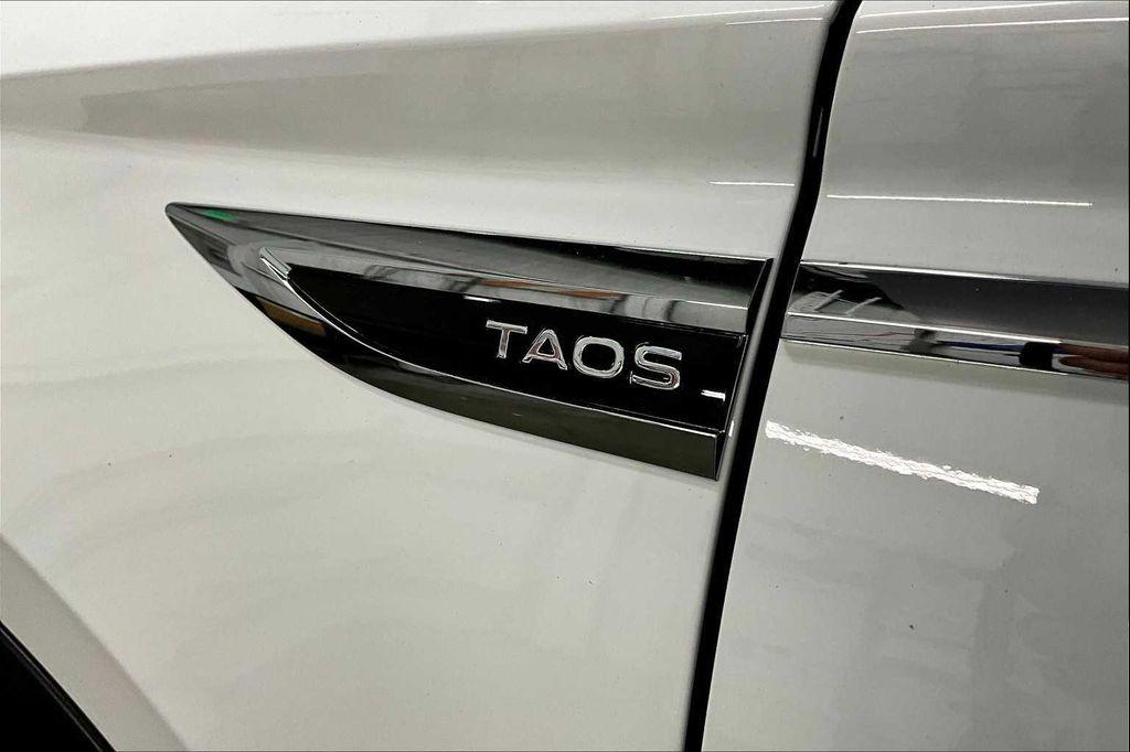 used 2023 Volkswagen Taos car, priced at $22,133
