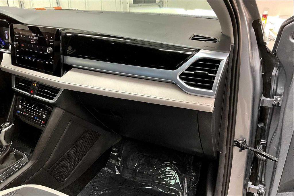 used 2025 Volkswagen Taos car, priced at $31,095
