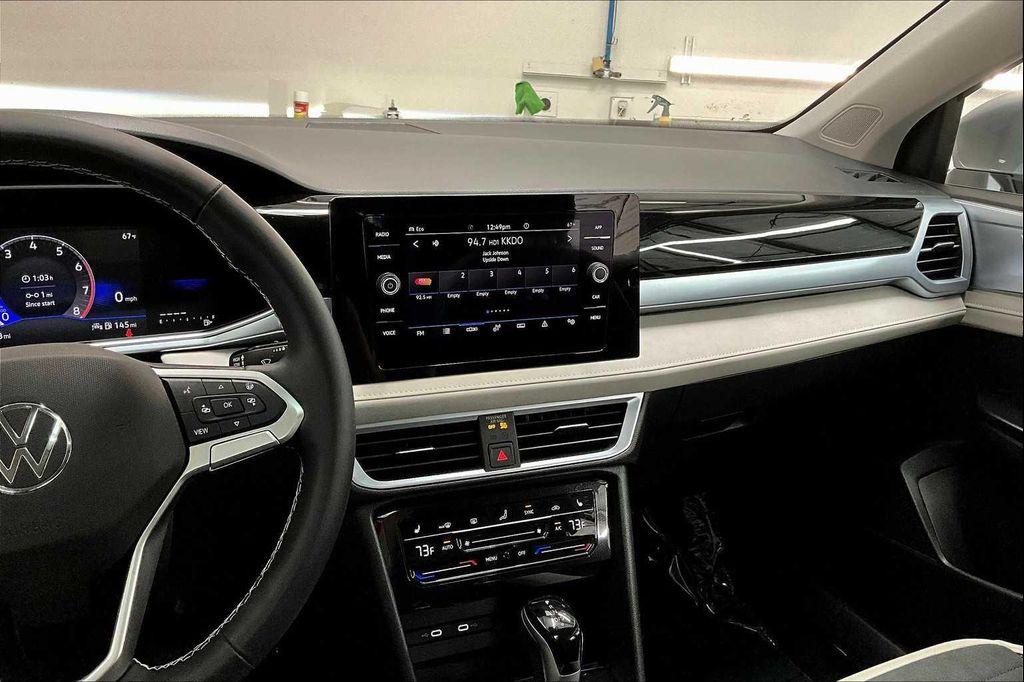 used 2025 Volkswagen Taos car, priced at $31,095