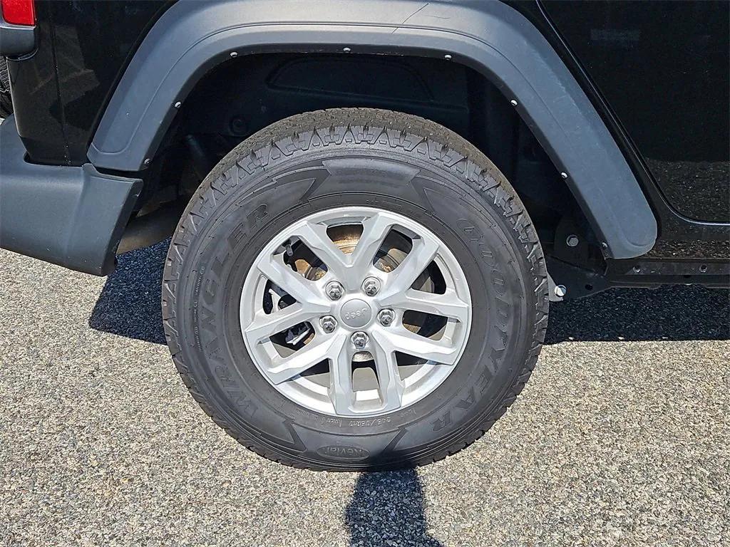 used 2023 Jeep Wrangler car, priced at $27,594