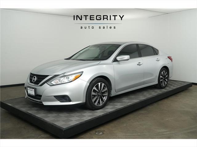 used 2018 Nissan Altima car, priced at $14,999