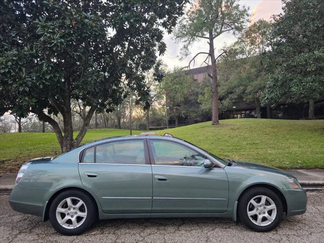 used 2006 Nissan Altima car, priced at $6,799