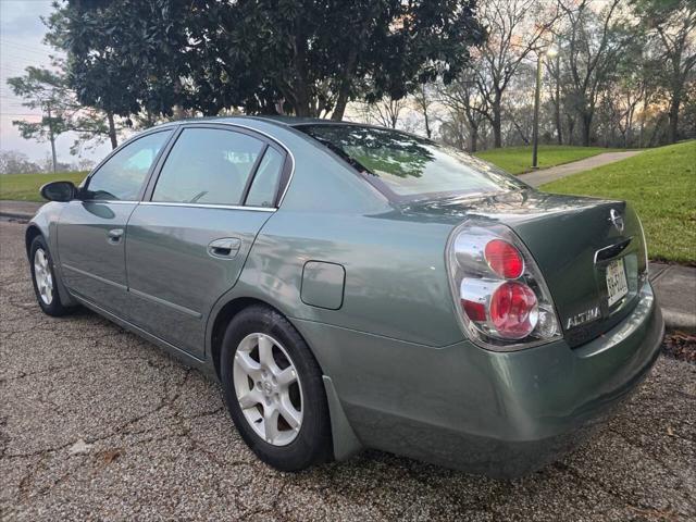 used 2006 Nissan Altima car, priced at $6,799