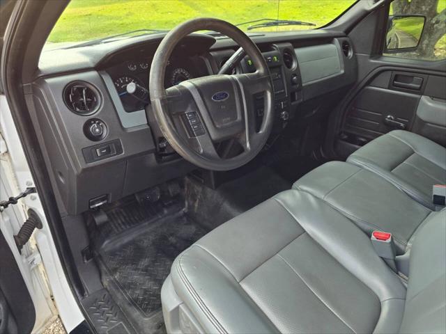 used 2014 Ford F-150 car, priced at $10,999