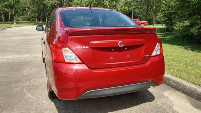 used 2015 Nissan Versa car, priced at $7,999