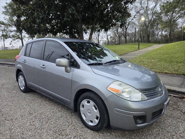 used 2009 Nissan Versa car, priced at $6,000