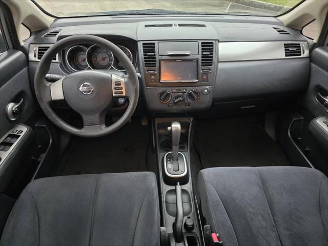 used 2009 Nissan Versa car, priced at $6,000