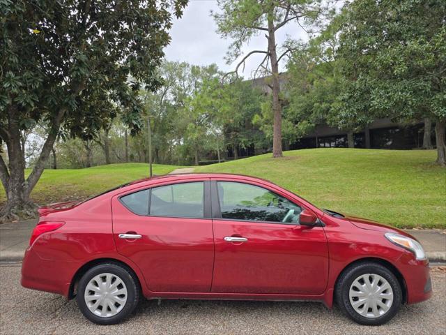 used 2016 Nissan Versa car, priced at $7,999