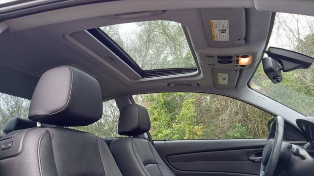 used 2013 BMW 128 car, priced at $12,999