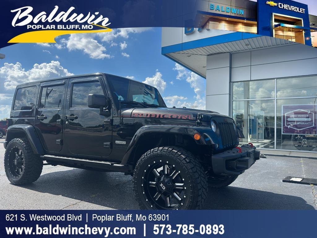 used 2018 Jeep Wrangler JK Unlimited car, priced at $26,988