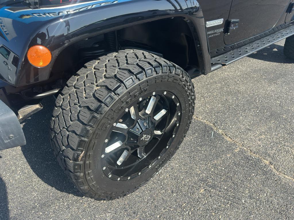 used 2018 Jeep Wrangler JK Unlimited car, priced at $26,988