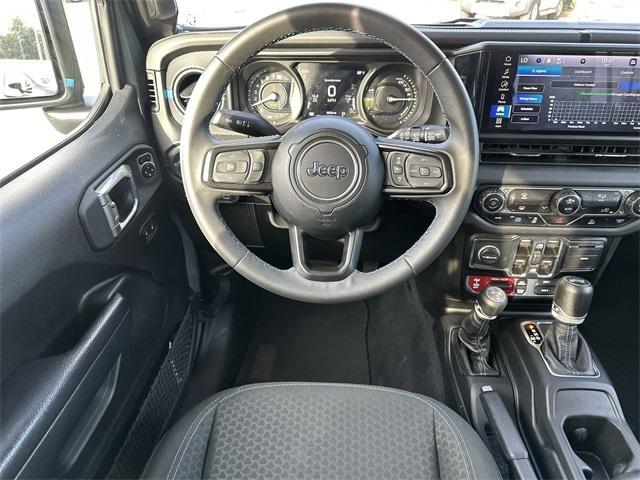 used 2024 Jeep Wrangler 4xe car, priced at $36,260