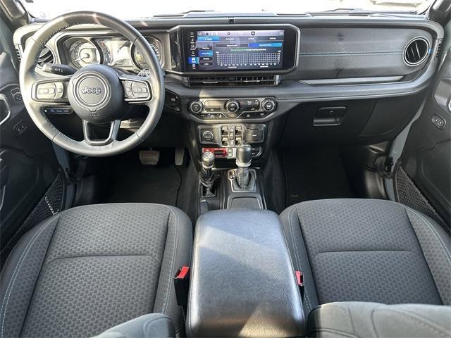 used 2024 Jeep Wrangler 4xe car, priced at $36,260