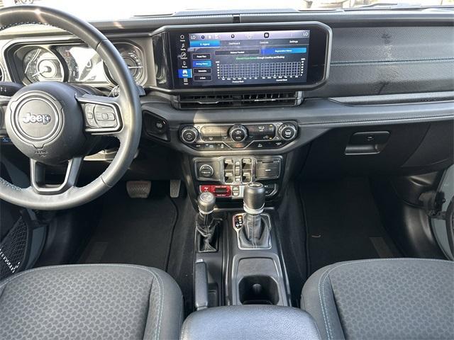 used 2024 Jeep Wrangler 4xe car, priced at $36,260