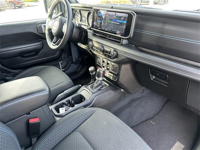 used 2024 Jeep Wrangler 4xe car, priced at $36,260