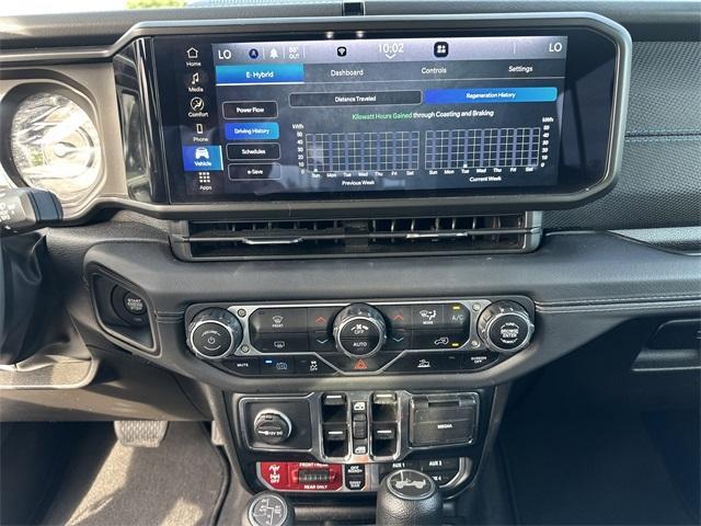 used 2024 Jeep Wrangler 4xe car, priced at $36,260