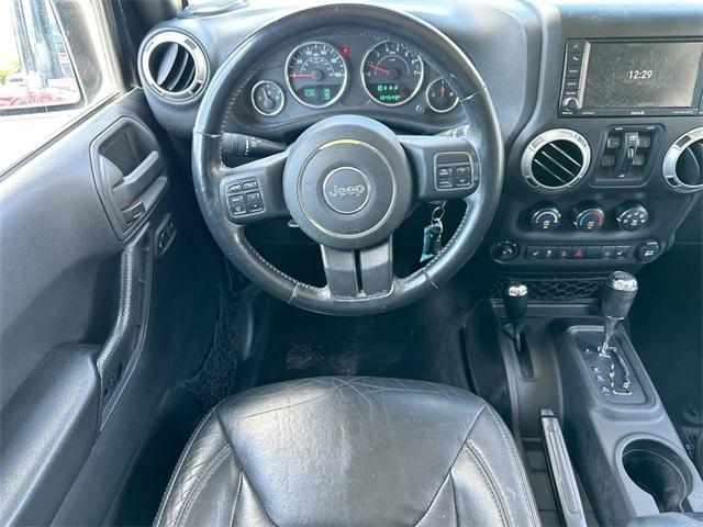 used 2015 Jeep Wrangler Unlimited car, priced at $15,893