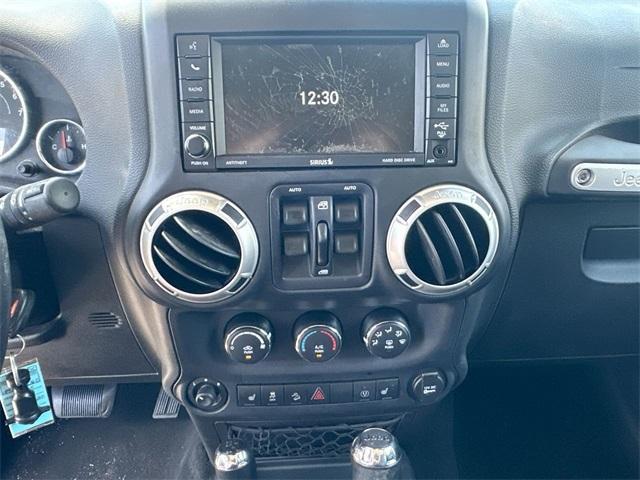 used 2015 Jeep Wrangler Unlimited car, priced at $15,893
