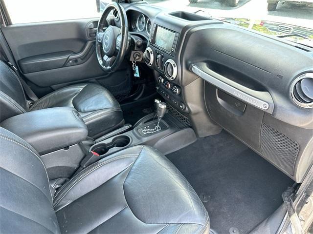 used 2015 Jeep Wrangler Unlimited car, priced at $15,893