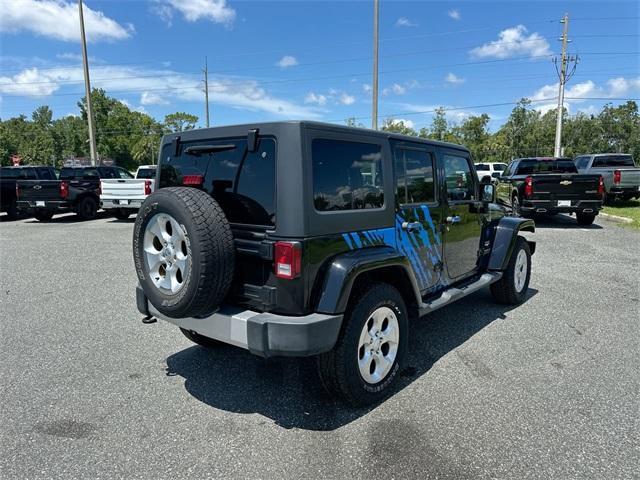 used 2015 Jeep Wrangler Unlimited car, priced at $15,893