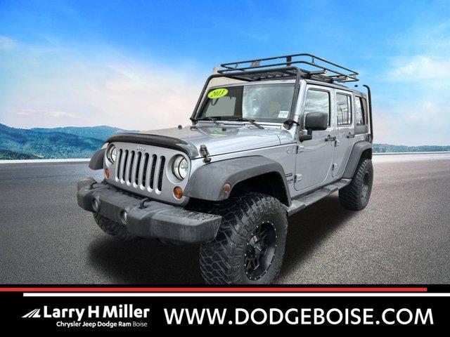 used 2013 Jeep Wrangler Unlimited car, priced at $18,893