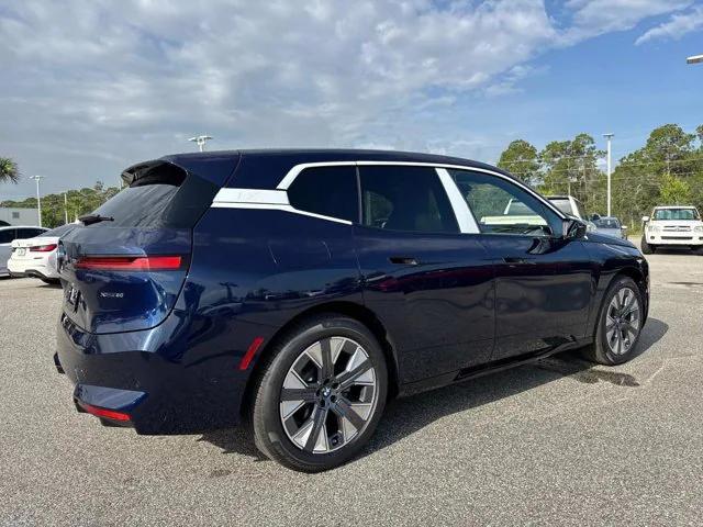 new 2026 BMW iX car, priced at $100,469