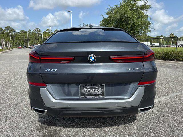 used 2022 BMW X6 car, priced at $55,971