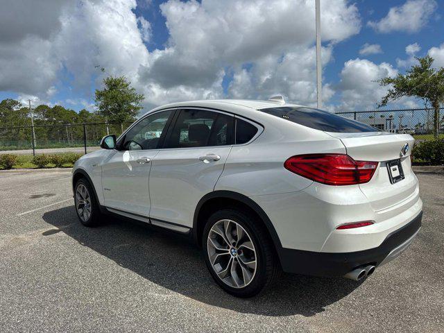 used 2018 BMW X4 car, priced at $20,974