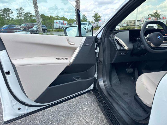 new 2026 BMW iX car, priced at $88,169