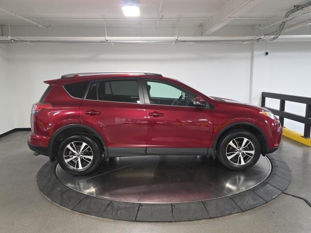used 2018 Toyota RAV4 car, priced at $19,998