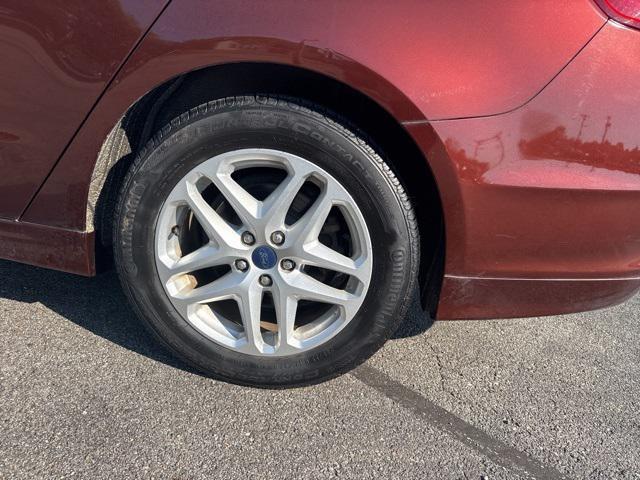 used 2016 Ford Fusion car, priced at $11,995