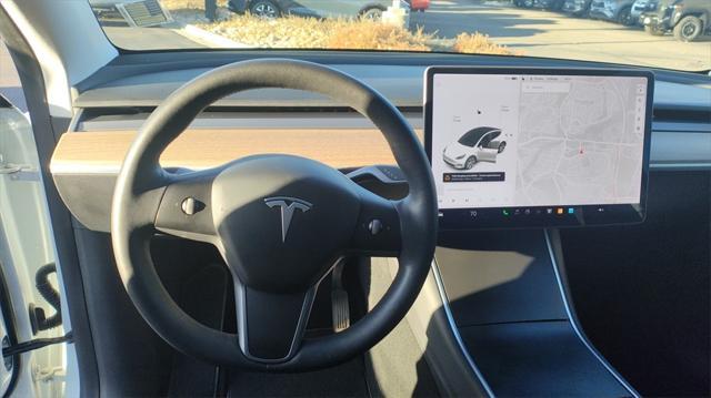 used 2021 Tesla Model Y car, priced at $27,000