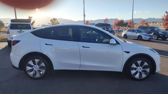 used 2021 Tesla Model Y car, priced at $27,000