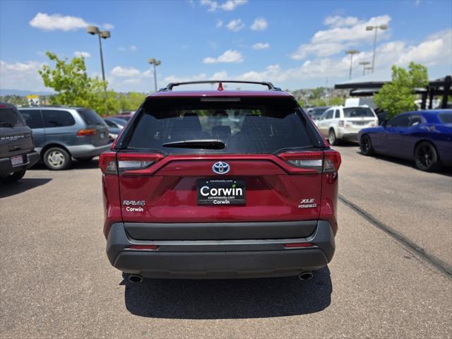 used 2021 Toyota RAV4 Hybrid car, priced at $27,000