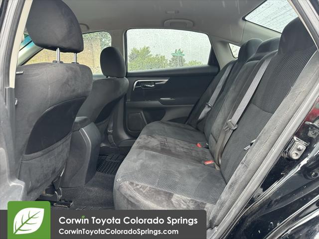 used 2014 Nissan Altima car, priced at $10,000
