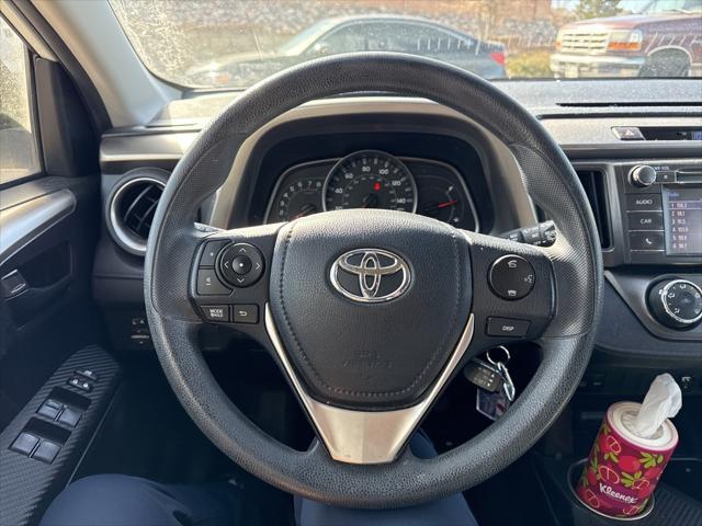 used 2014 Toyota RAV4 car, priced at $13,999