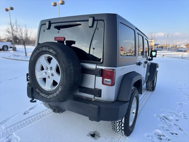 used 2013 Jeep Wrangler Unlimited car, priced at $13,000