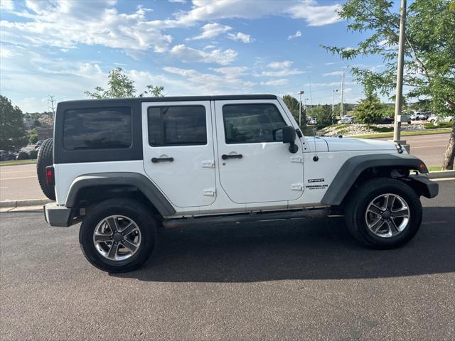 used 2014 Jeep Wrangler Unlimited car, priced at $14,000