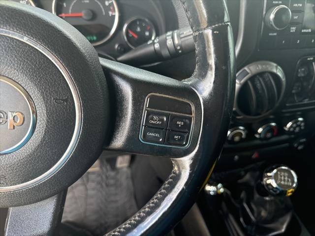 used 2014 Jeep Wrangler Unlimited car, priced at $14,000