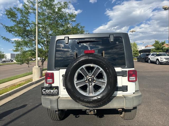 used 2014 Jeep Wrangler Unlimited car, priced at $14,000