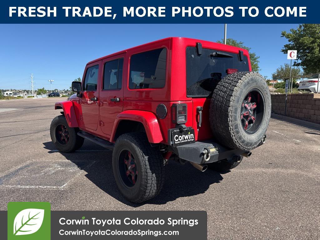 used 2015 Jeep Wrangler Unlimited car, priced at $18,350