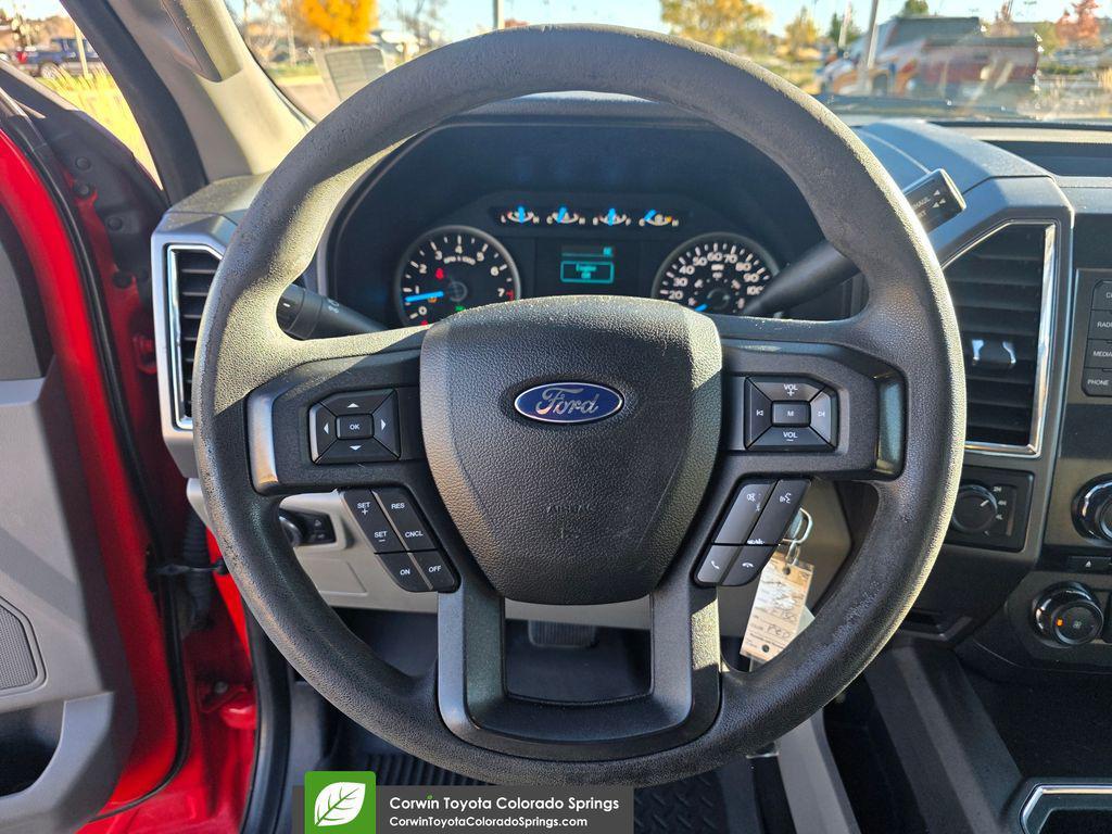 used 2015 Ford F-150 car, priced at $14,000