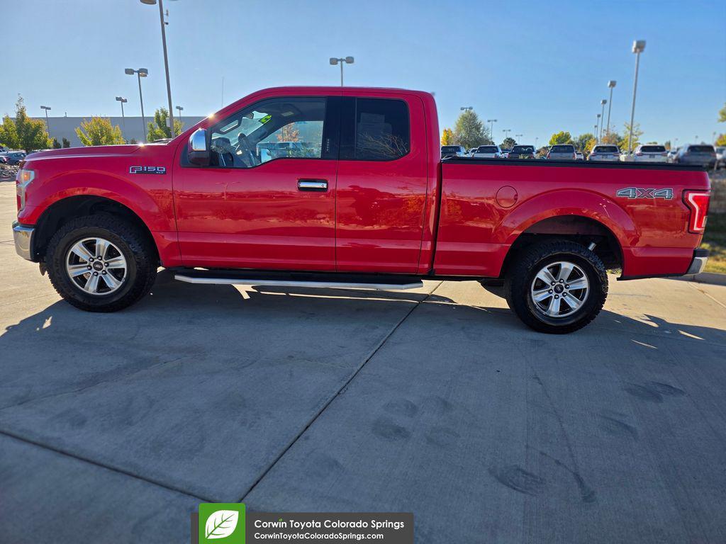 used 2015 Ford F-150 car, priced at $14,000