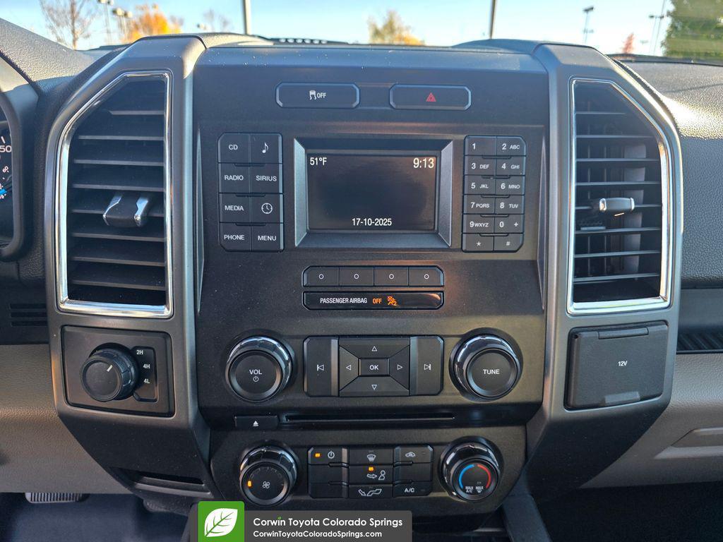 used 2015 Ford F-150 car, priced at $14,000
