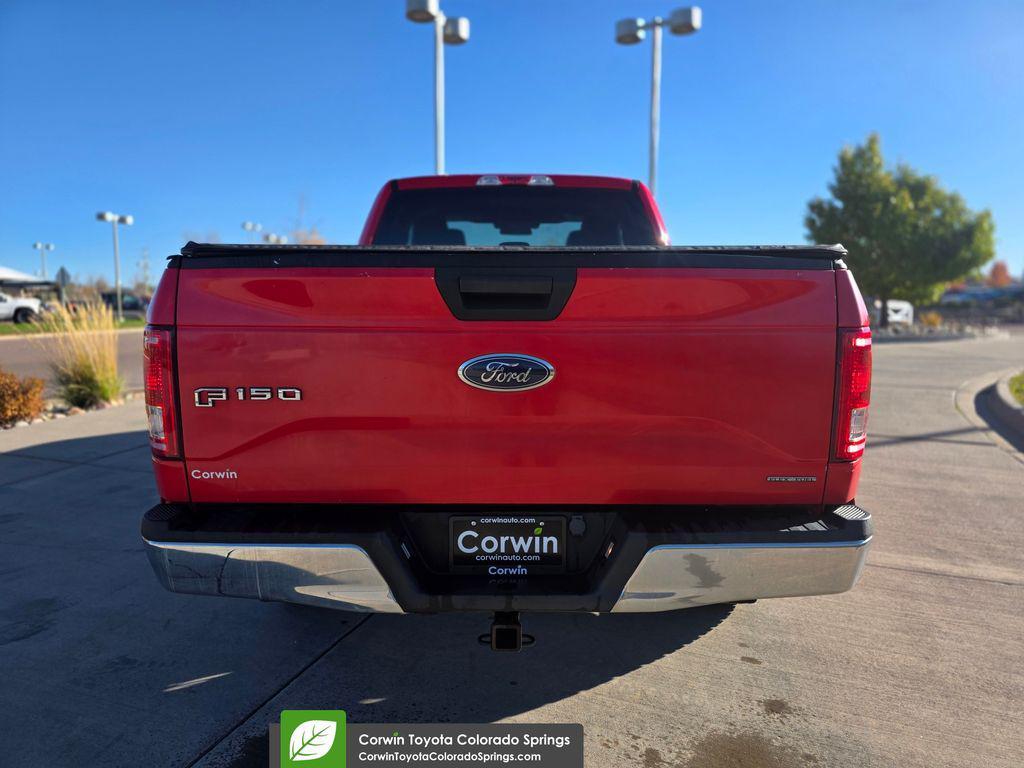 used 2015 Ford F-150 car, priced at $14,000