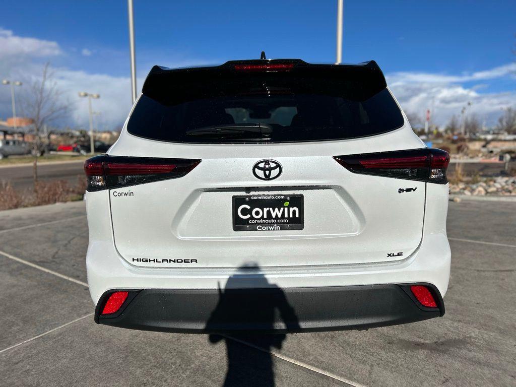 used 2025 Toyota Highlander Hybrid car, priced at $53,056