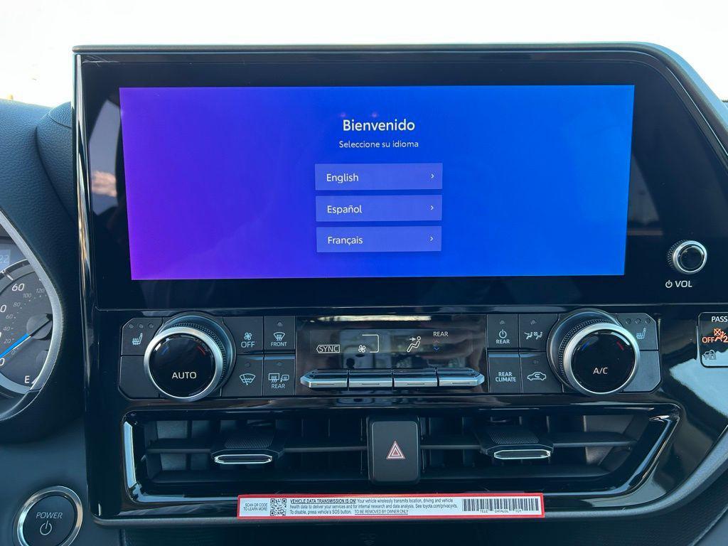 used 2025 Toyota Highlander Hybrid car, priced at $53,056