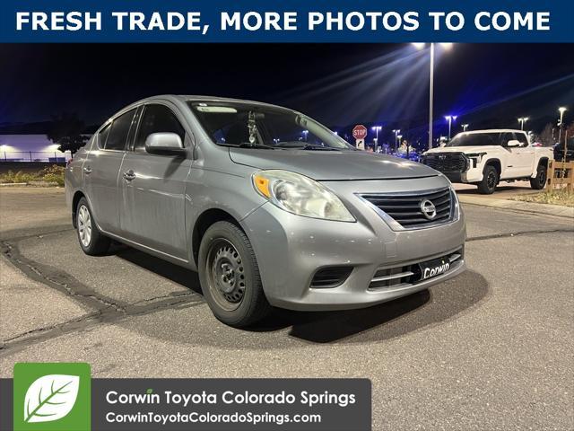 used 2014 Nissan Versa car, priced at $7,000