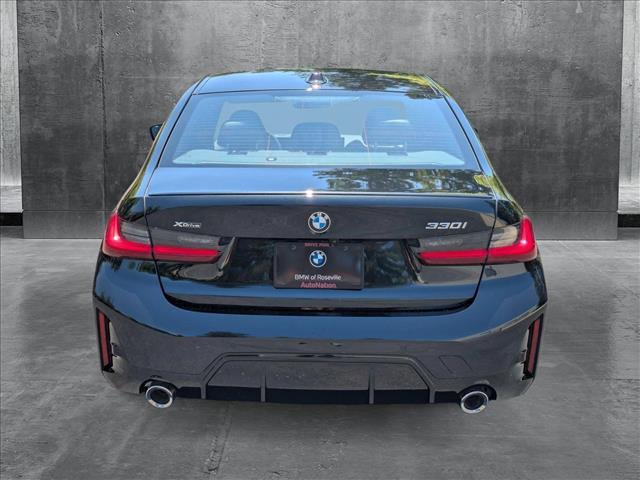 new 2025 BMW 330 car, priced at $53,975