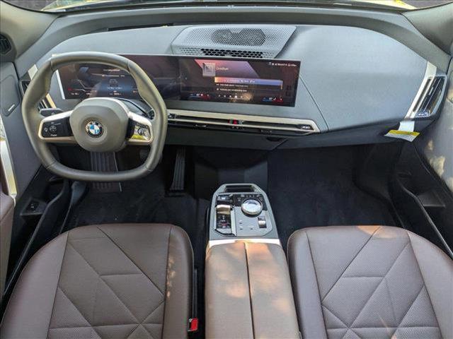new 2026 BMW iX car, priced at $96,670